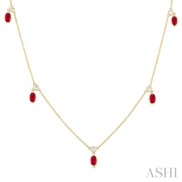 5x3 MM Oval Shape Ruby and 1/8 Ctw Round Cut Diamonds Precious Station Necklace in 10K Yellow Gold