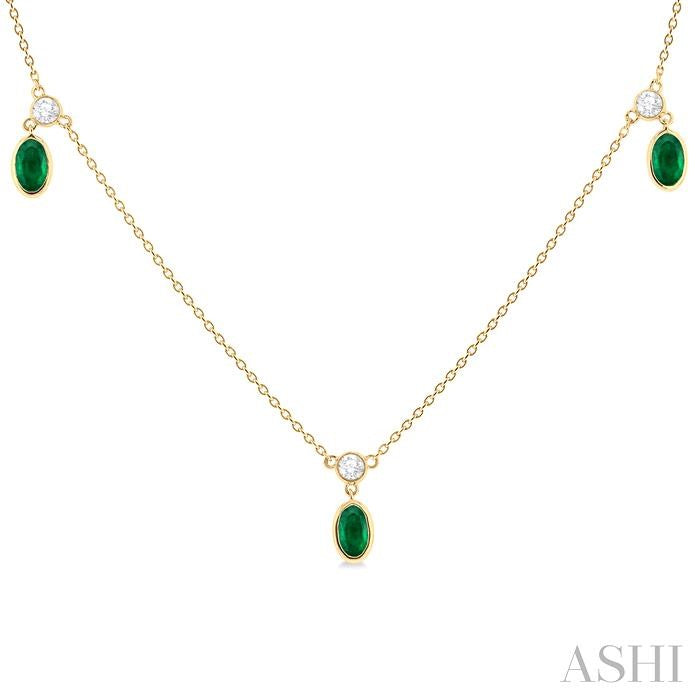 5x3 MM Oval Shape Emerald and 1/4 Ctw Round Cut Diamonds Precious Station Necklace in 10K Yellow Gold