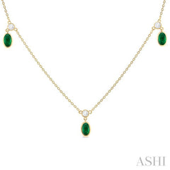 5x3 MM Oval Shape Emerald and 1/4 Ctw Round Cut Diamonds Precious Station Necklace in 10K Yellow Gold