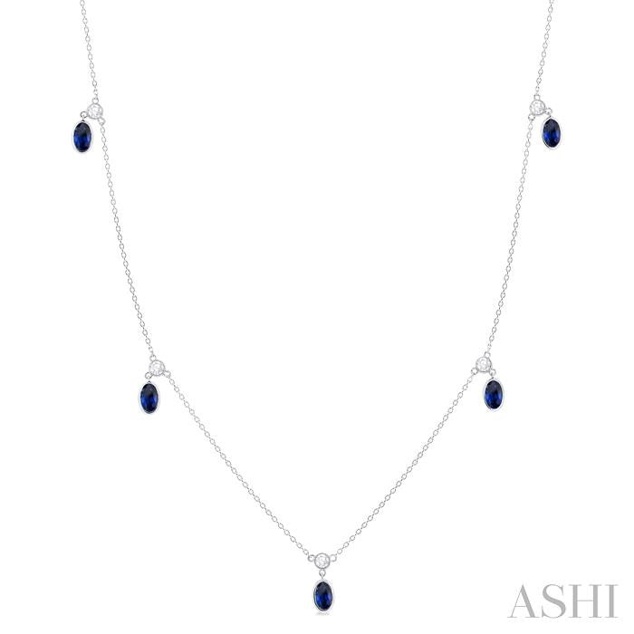 5x3 MM Oval Shape Sapphire and 1/4 Ctw Round Cut Diamonds Precious Station Necklace in 10K White Gold